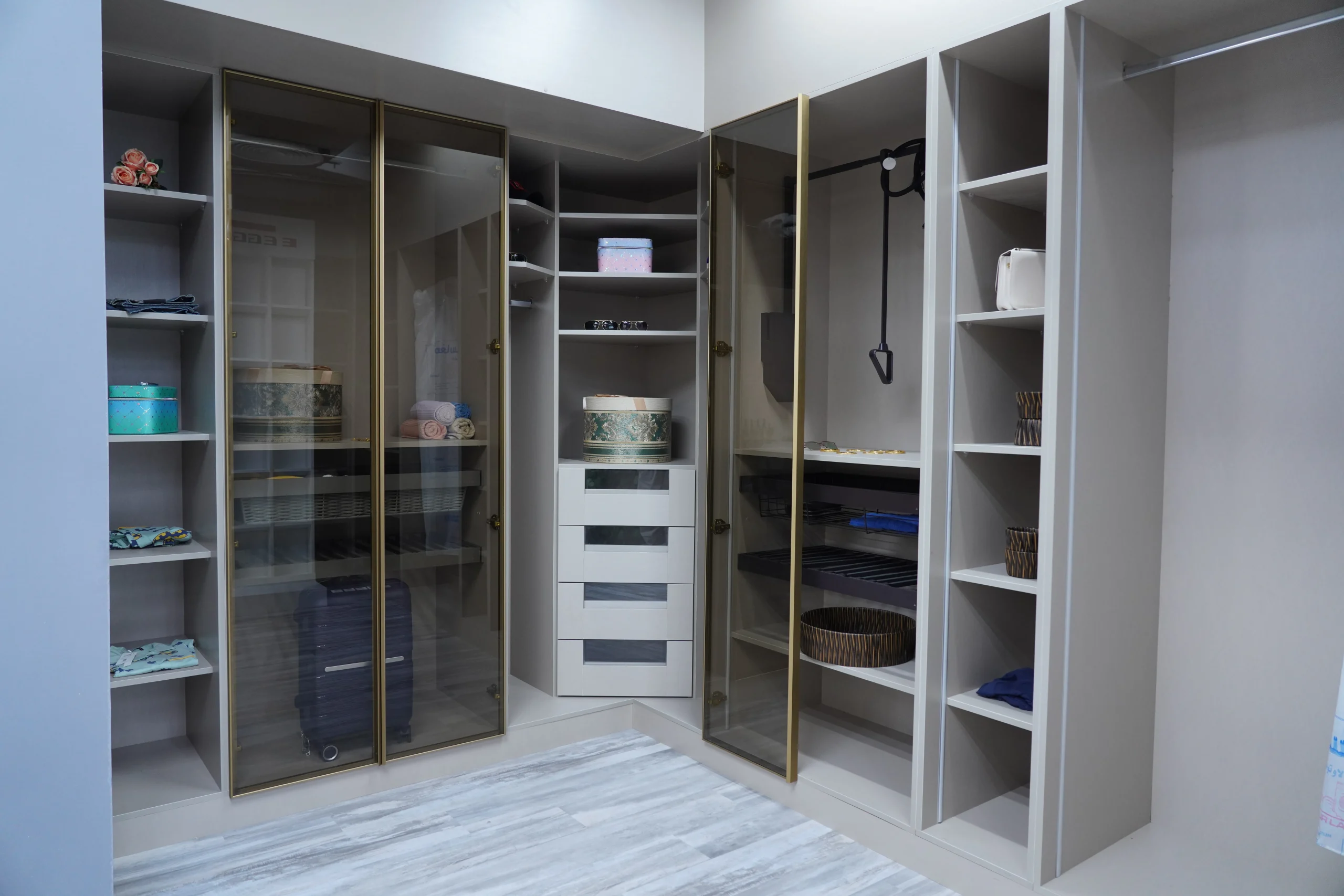 L-Shaped Walk-in Closet with Glass Doors